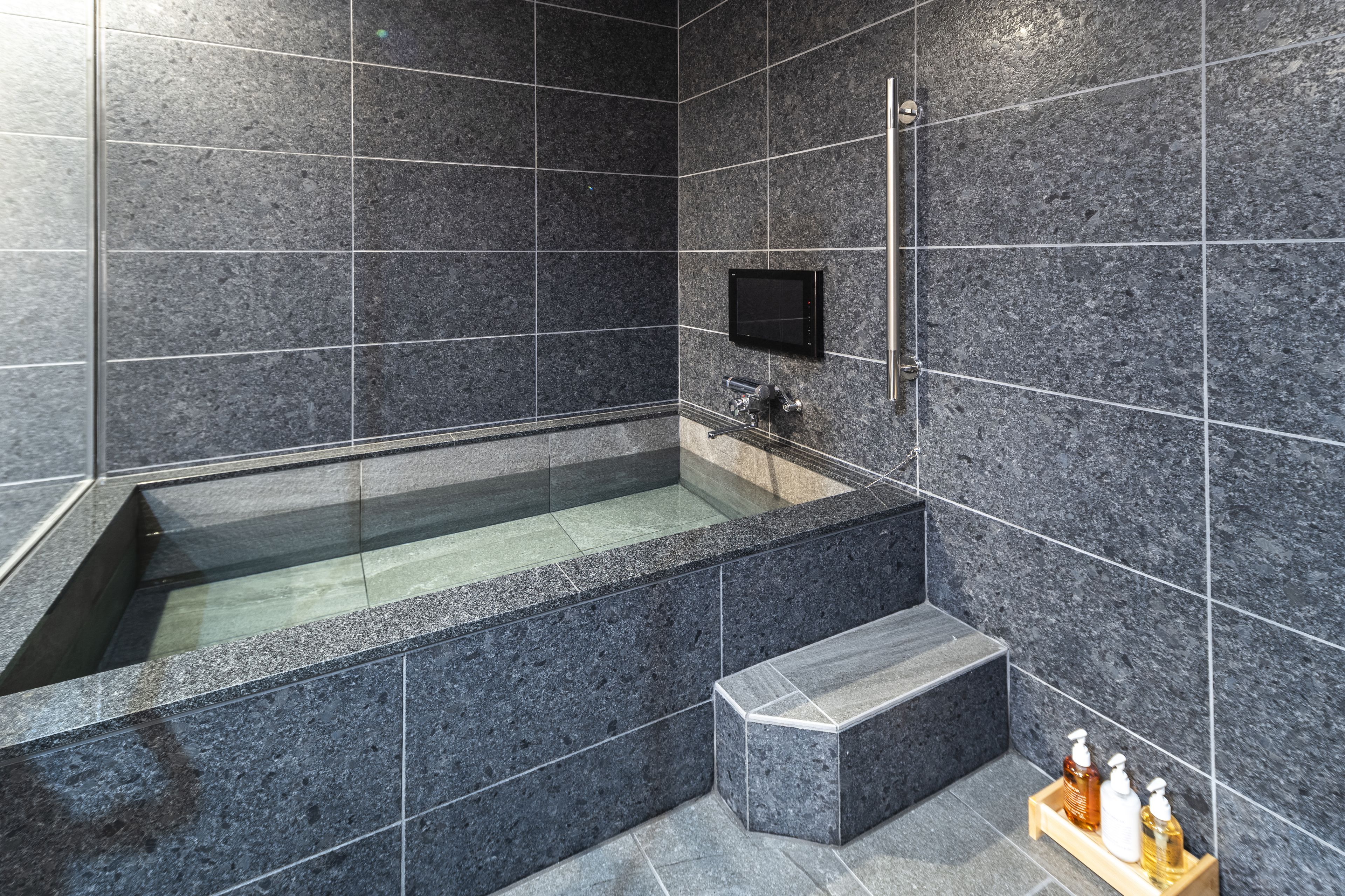 separate bathtub and shower, deep-soaking bathtub, rainfall showerhead