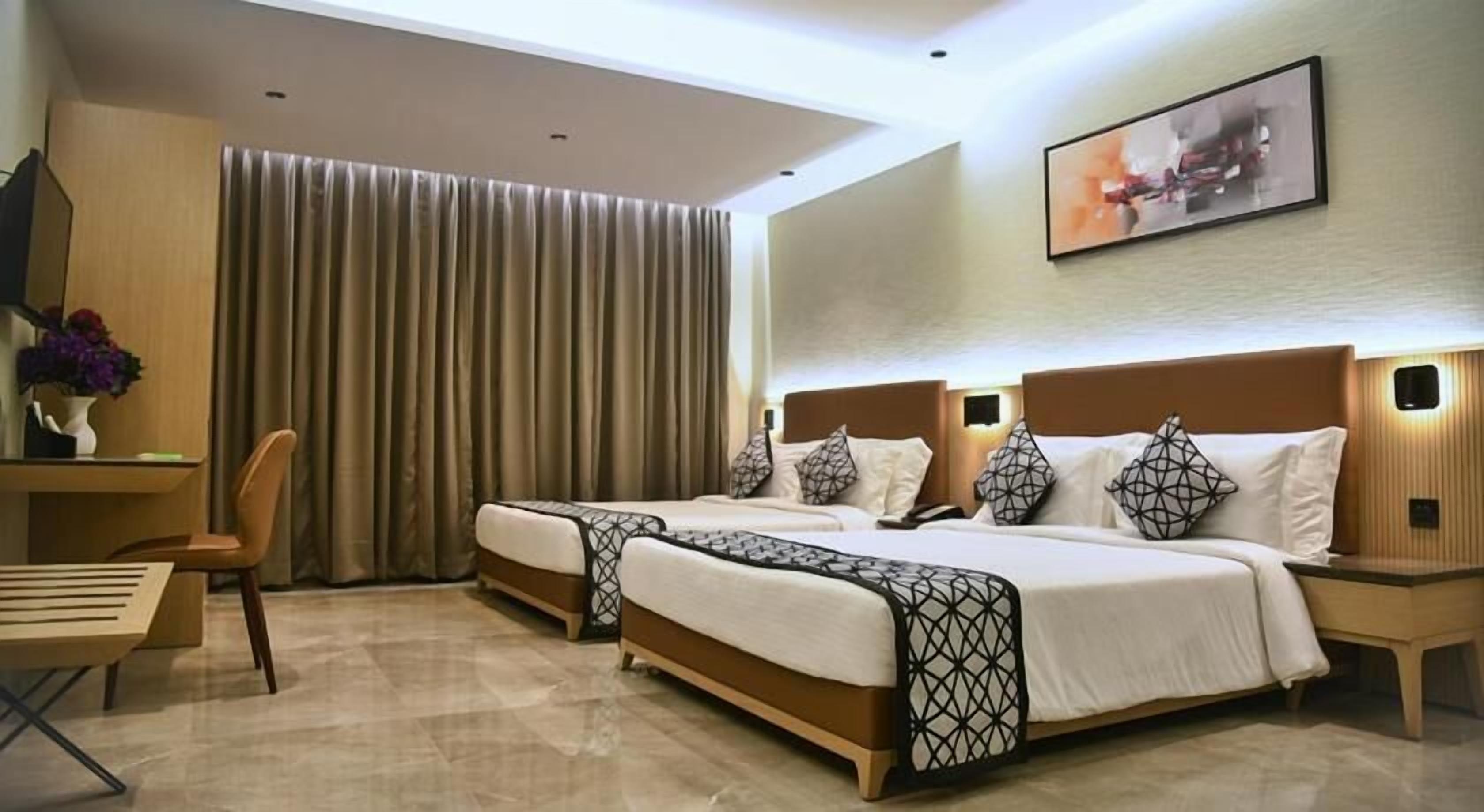Hypo-allergenic bedding, in-room safe, desk, laptop workspace