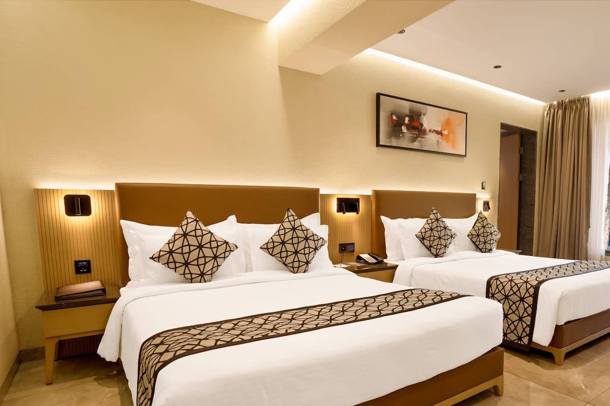 Hypo-allergenic bedding, in-room safe, desk, laptop workspace