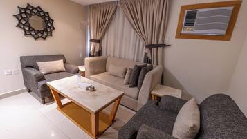 Apartment, 1 Bedroom | In-room safe, iron/ironing board, free WiFi