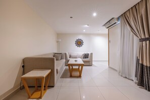 Appartement, 1 chambre | Coffres-forts dans les chambres, fer et planche à repasser