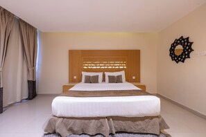 Departamento, 1 habitación | Caja de seguridad en la habitación y tabla de planchar con plancha 