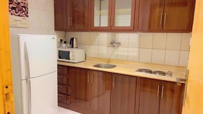 Apartment, 1 Bedroom | In-room safe, iron/ironing board, free WiFi