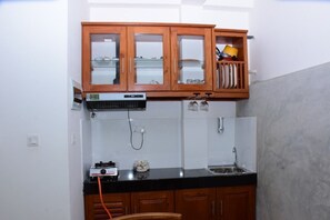 Deluxe Villa, 1 Bedroom, Smoking, Garden Area | Private kitchen | Full-size fridge, microwave, dishwasher, coffee/tea maker