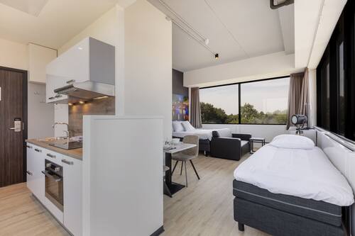 Tripla panoramica, letti multipli, non fumatori, cucina | Area soggiorno | Smart TV, Netflix