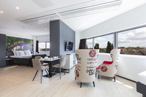 Deluxe Quadruple Room, Multiple Beds, Non Smoking, Kitchen | Living area | Smart TV, Netflix