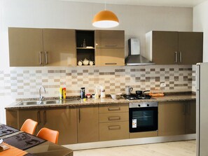 Appartement Ville | Cuisine privée | Réfrigérateur, four, plaque de cuisson, lave-vaisselle