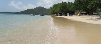 Pretty, old Creole villa with veranda, gazebo and floral garden.