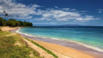 On the beach, sun-loungers, beach towels