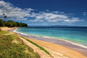 On the beach, sun-loungers, beach towels
