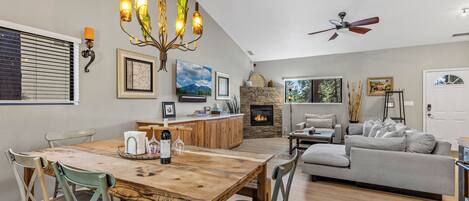 Smart TV, fireplace, books, stereo