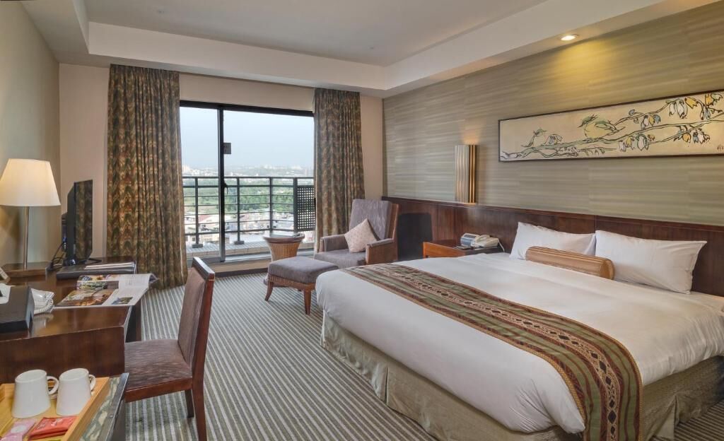 deluxe room | in-room safe, desk, laptop workspace, blackout curtains