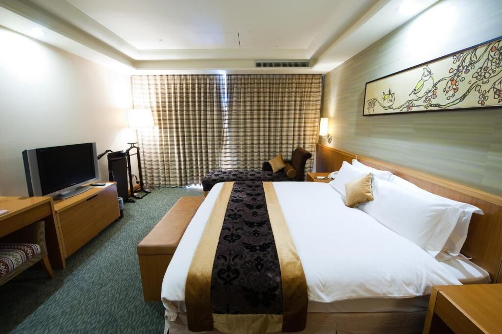 premium suite | in-room safe, desk, laptop workspace, blackout curtains