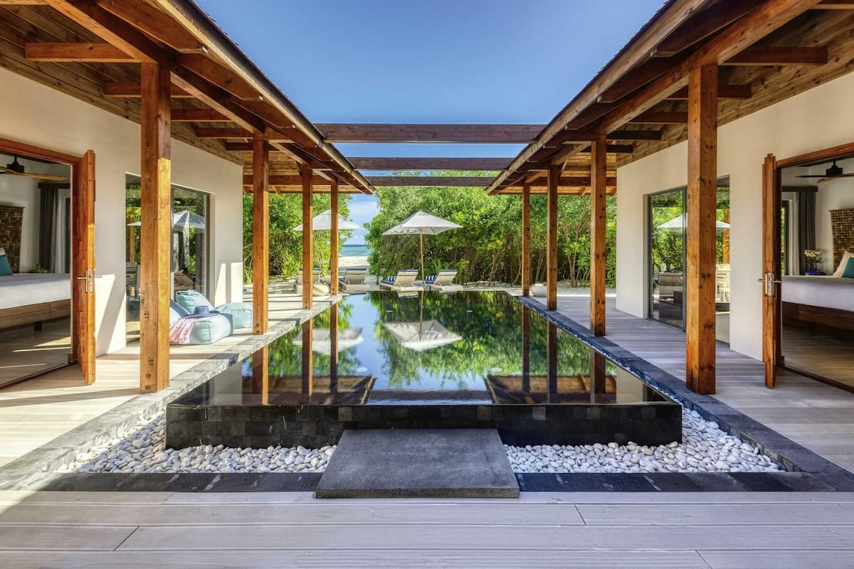 Four Bedroom Beach Pool Residence | Memory foam beds, minibar, in-room safe, individually decorated