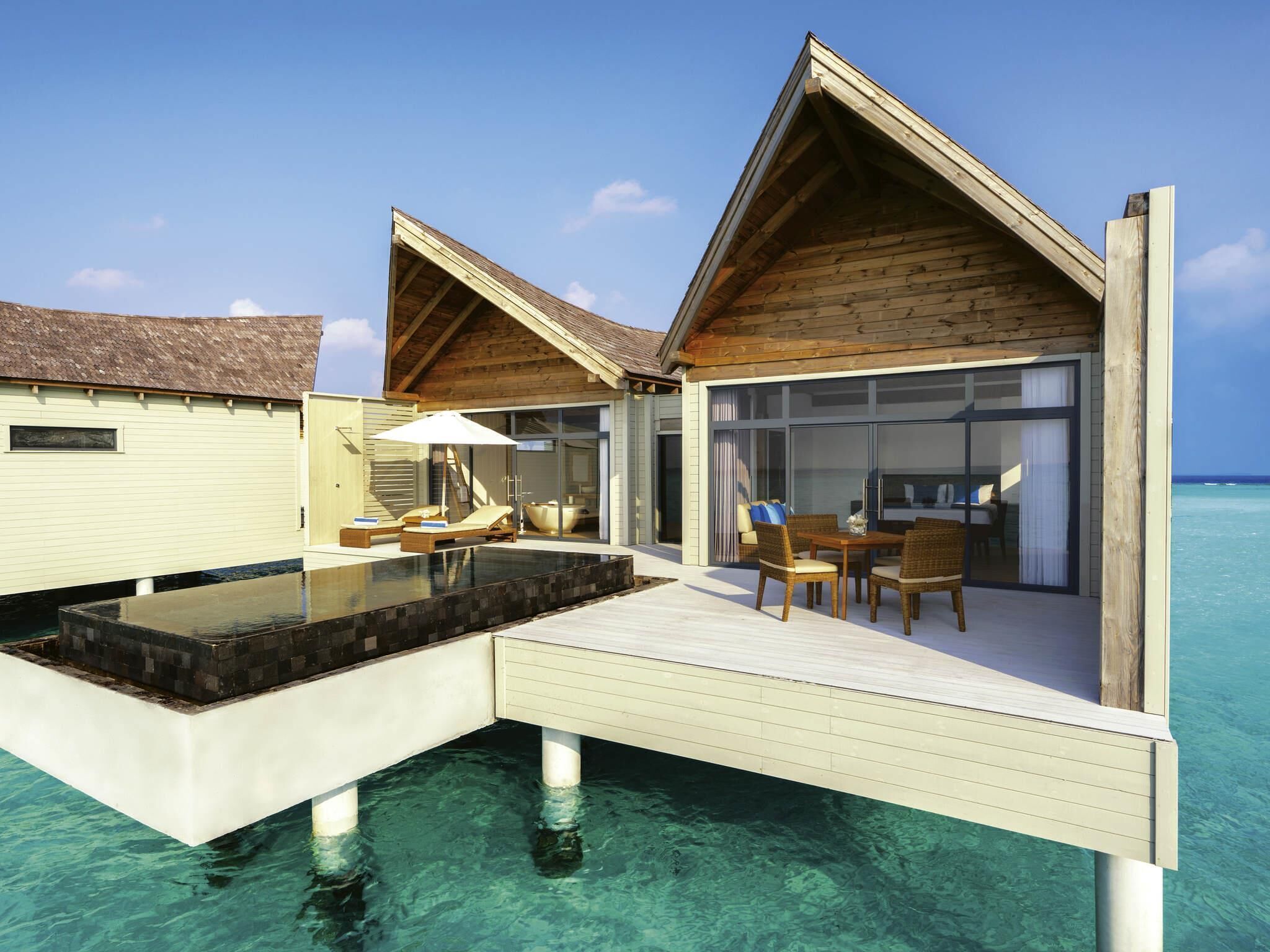 Overwater Pool Villa Sunrise | Memory foam beds, minibar, in-room safe, individually decorated