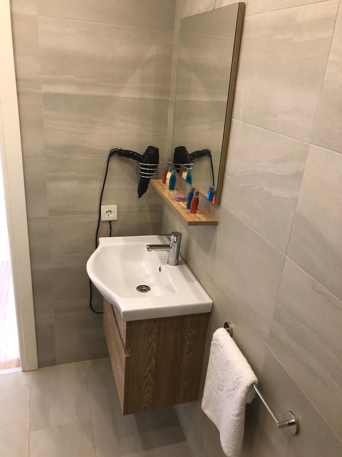 standard loft, 1 king bed | bathroom | shower, free toiletries, hair dryer, slippers