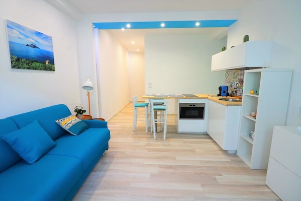 Apartment, 1 Bedroom, Smoking, Balcony | Living area | LED TV