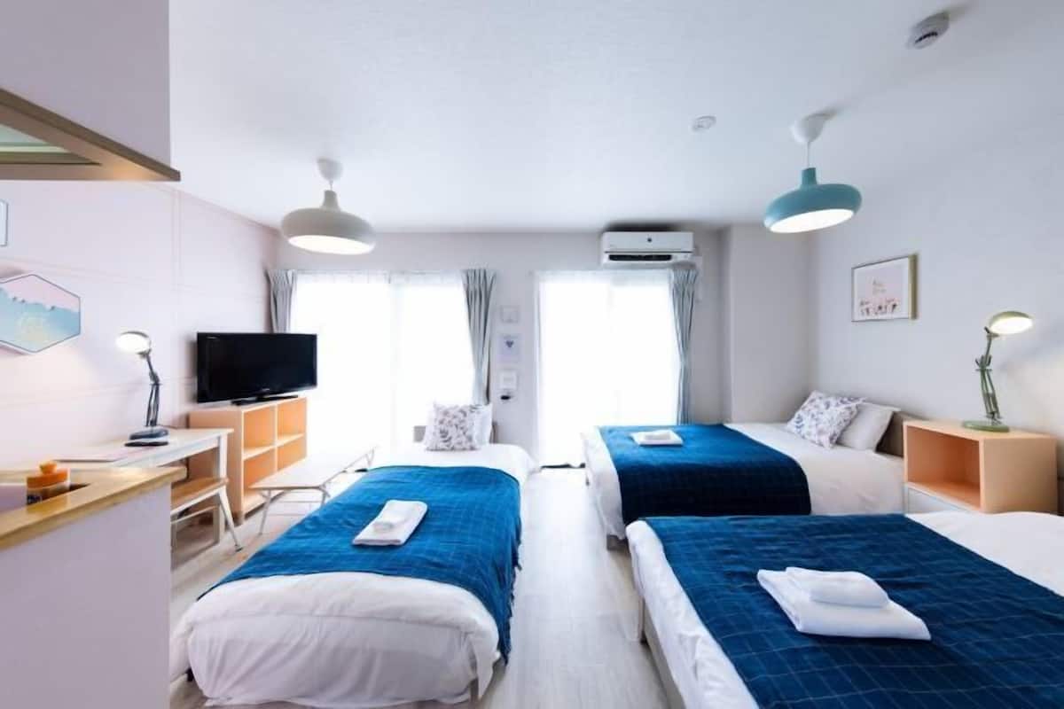 Desk, laptop workspace, blackout curtains, free WiFi