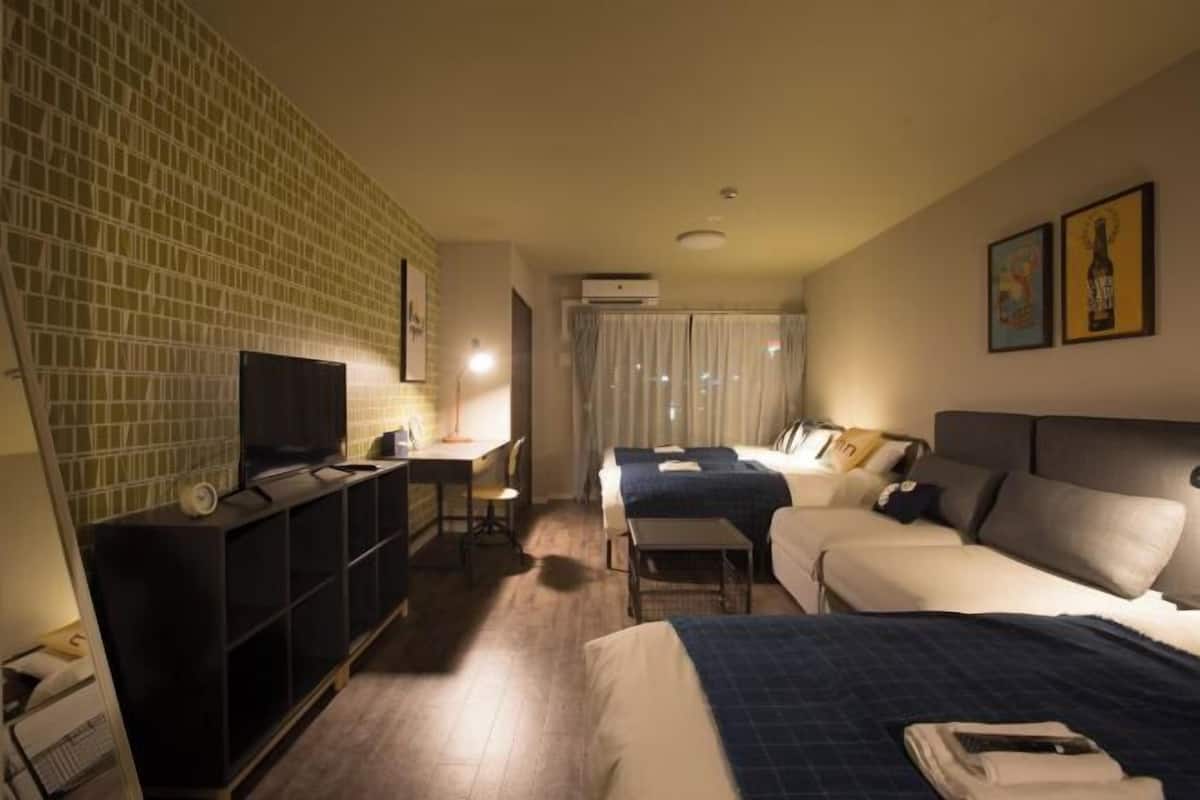 Desk, laptop workspace, blackout curtains, free WiFi