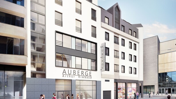 A modern building with a prominent sign for 'AUBERGE Arthur Rimbaud' on the ground floor.