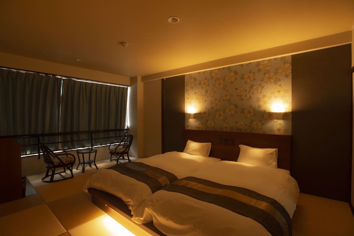 standard twin room, 2 single beds, non smoking, ocean view | 1 bedroom, down duvets, in-room safe, blackout curtains