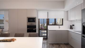 Elite Apartment | Living area | 43-inch Smart TV with cable channels, TV