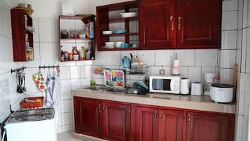 Comfort Double Room (Le Point Depart) | Private kitchen | Fridge, microwave, oven, stovetop