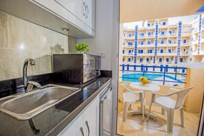 Pool View, Balcony, Kitchenette, Washing Machine | Tiba Resort E4 | Balcony view - Tiba Resort Nearby El Gouna (Hurghada)