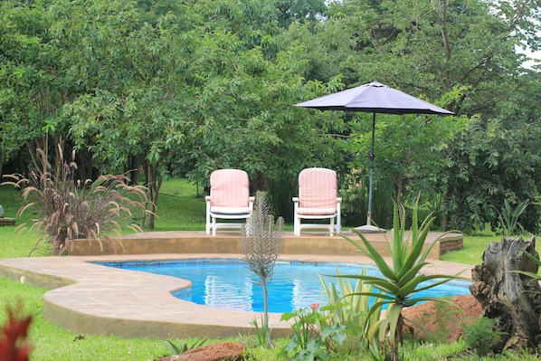 2 outdoor pools, pool umbrellas, pool loungers