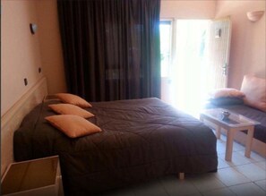 Suite, 1 lit double | Rideaux occultants, draps fournis