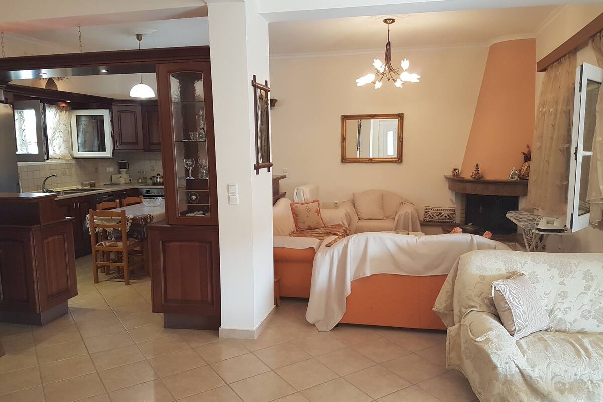 Apartment, Sea View | Living area | Flat-screen TV