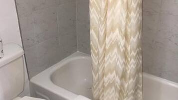 Deep soaking tub, towels