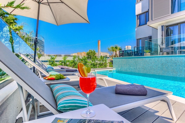 Seasonal outdoor pool, open 8:00 AM to 8 PM, pool umbrellas - Bel Residence (Split)