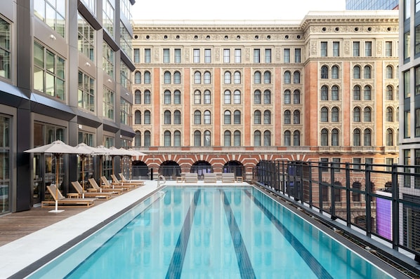 Outdoor pool, pool umbrellas, pool loungers