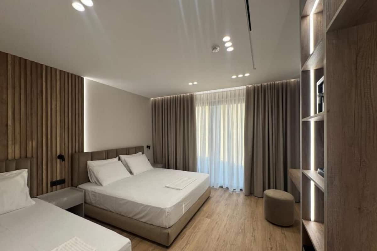 Triple Room, Sea View | Iron/ironing board, free WiFi, bed sheets