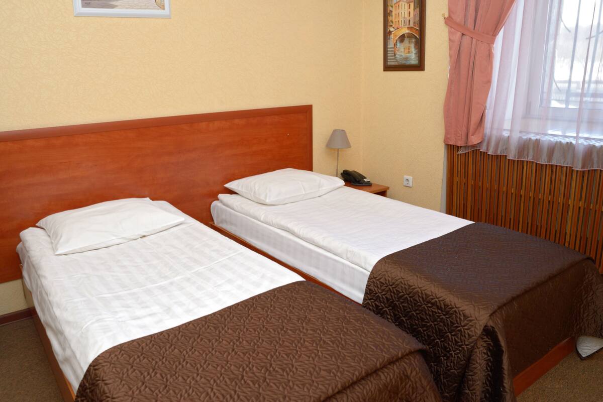 Suíte júnior | Camas extras/dobráveis (sobretaxa), Wi-Fi de cortesia, roupa de cama