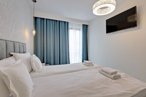 Huoneisto (Chmielna 38) | 1 makuuhuone, ylelliset vuodevaatteet, tallelokero huoneessa