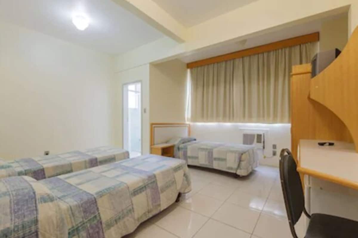 Minibar, desk, laptop workspace, iron/ironing board