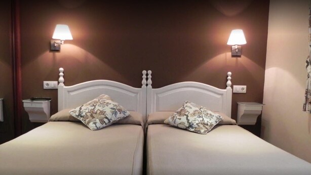Habitación estándar con 1 cama doble o 2 individuales