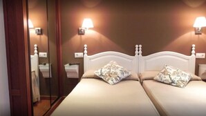 Habitación estándar con 1 cama doble o 2 individuales