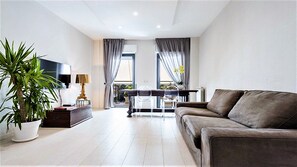 Apartamento luxo | Área de estar | Netflix