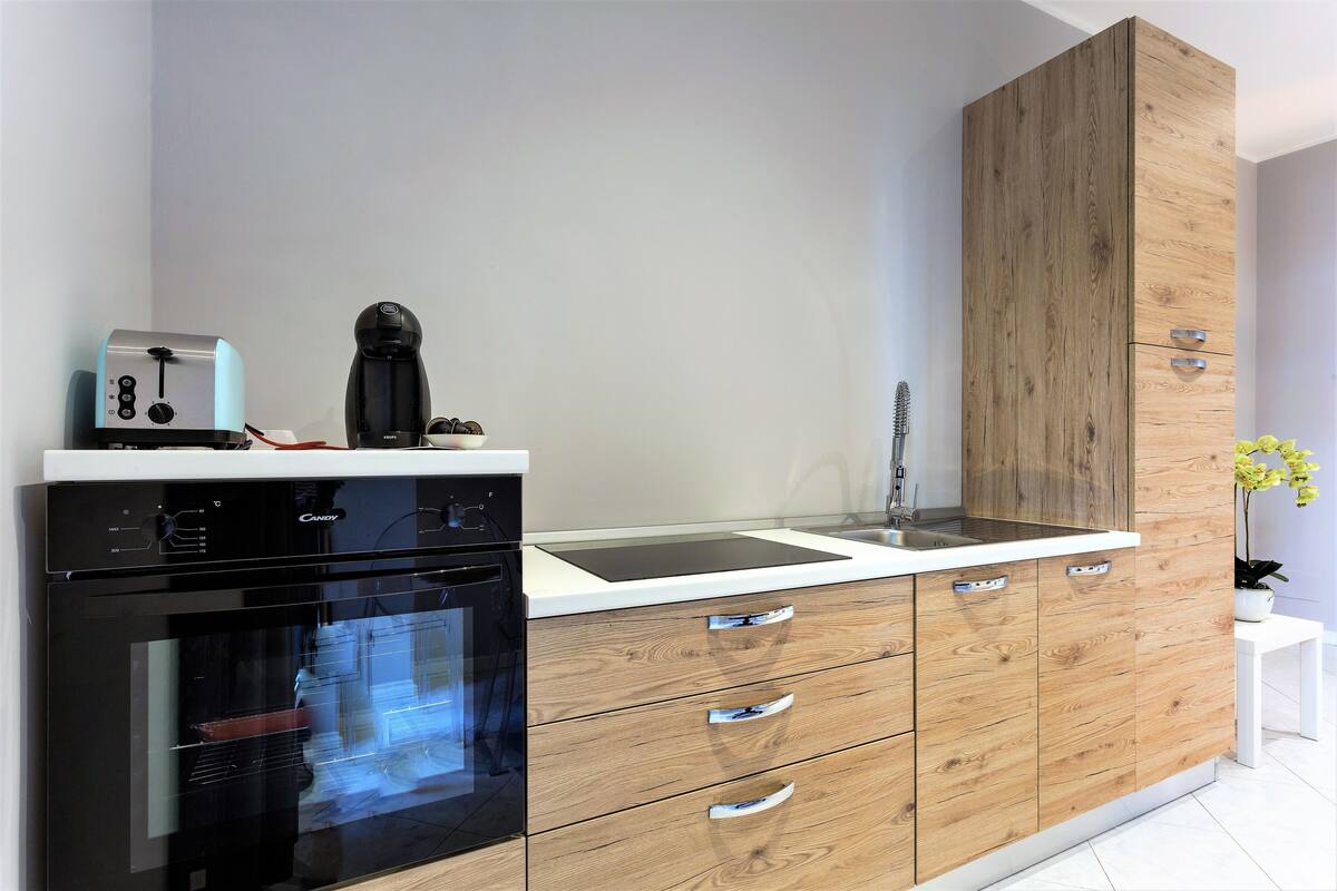 Appartement, vue sur le jardin | Cuisine privée | Cafétière à espresso, cafetière-théière, réfrigérateur, un four