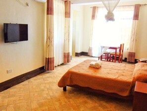 Superior Single Room | Desk, laptop workspace, free WiFi, bed sheets - Modest Inn Limited (Kampala)