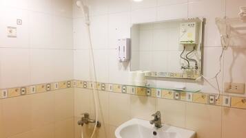 Shower, free toiletries, hair dryer, slippers