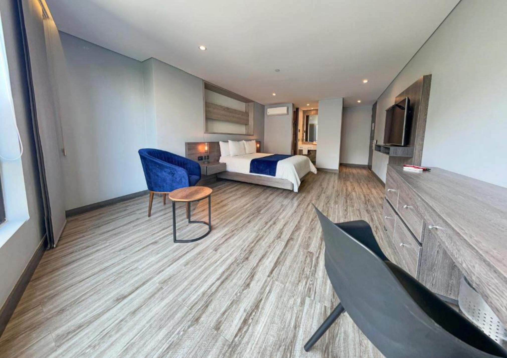 Down comforters, pillowtop beds, in-room safe, desk