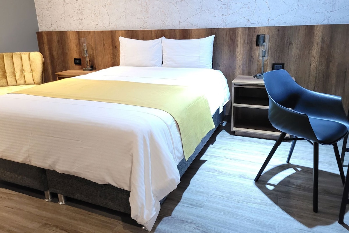 Down comforters, pillowtop beds, in-room safe, desk