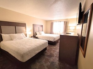 Kamer, 2 queensize bedden (Stardust) | Verduisterende gordijnen, een strijkplank/strijkijzer, gratis wifi