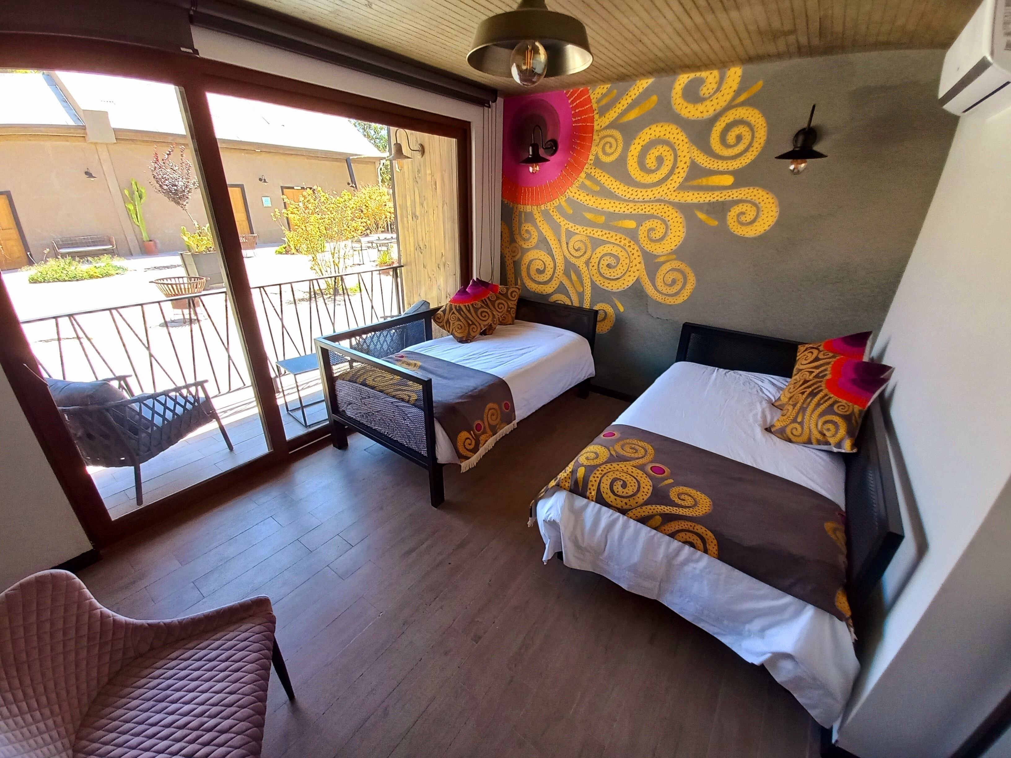 signature quadruple room, 2 bedrooms, private bathroom, courtyard view | 1 bedroom, premium bedding, pillow-top beds, minibar