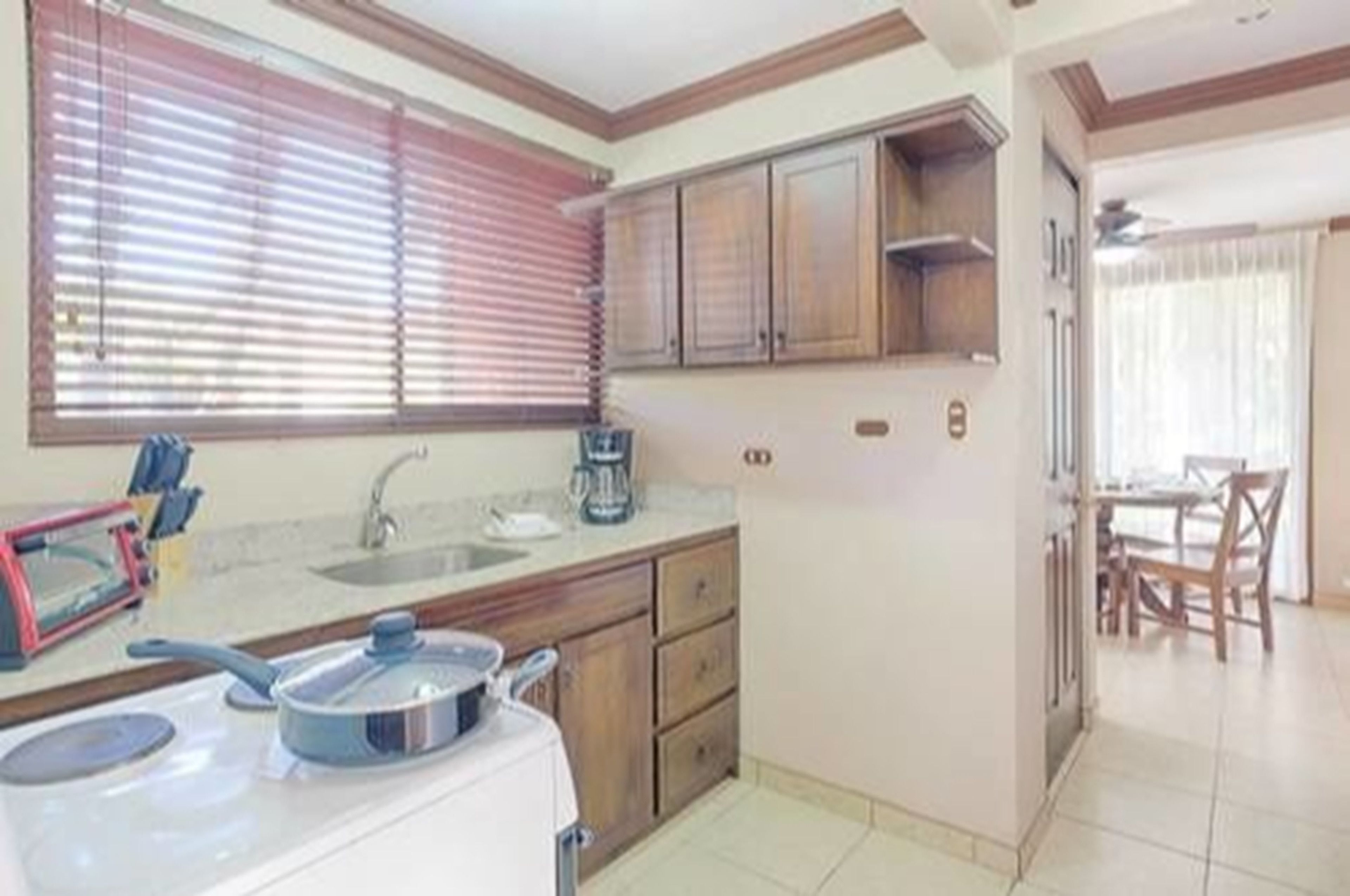 family apartment, multiple beds, non smoking | private kitchen | full-sized fridge, oven, stovetop, rice cooker