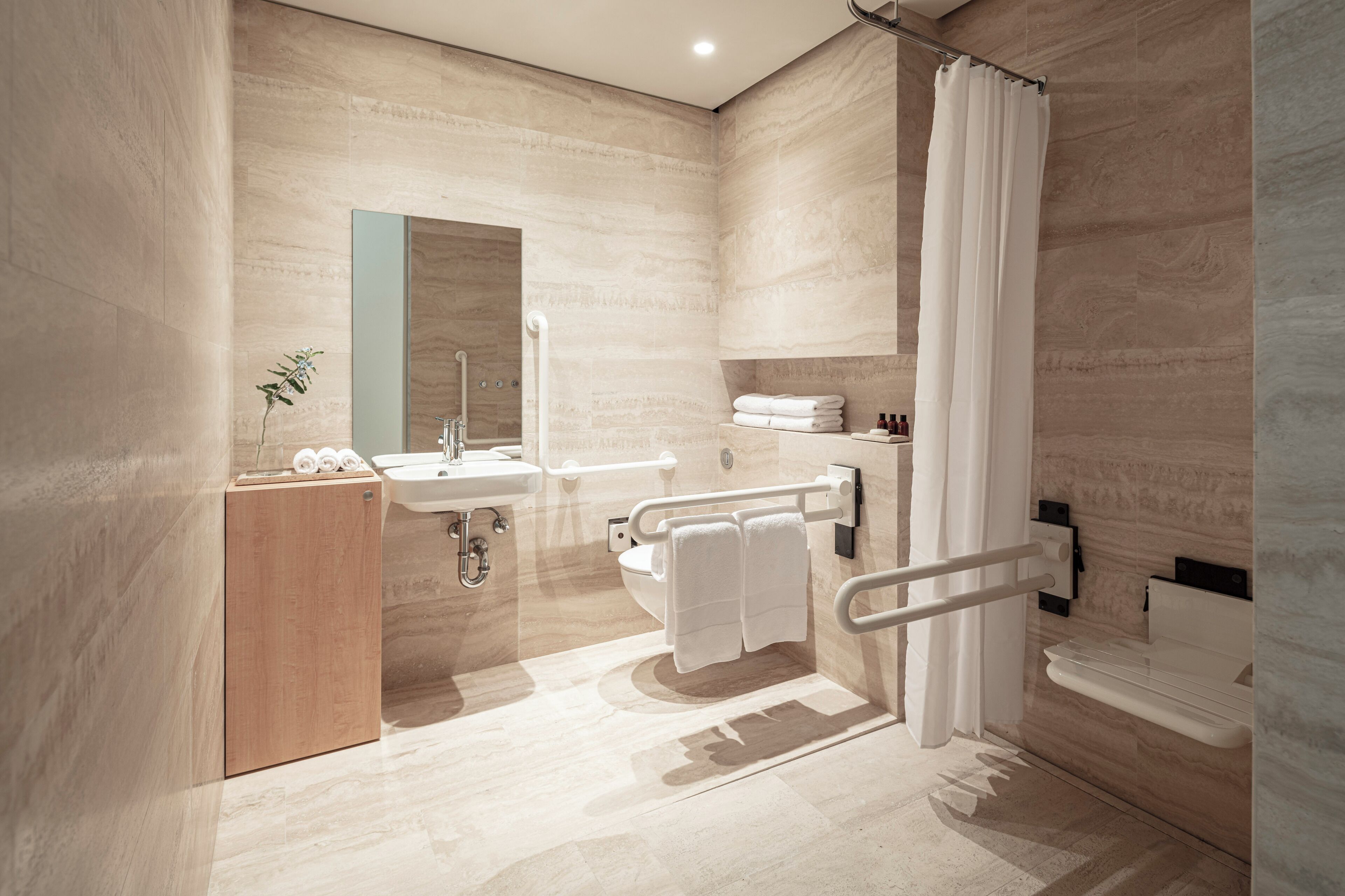 accessible deluxe balcony | bathroom | shower, rainfall showerhead, free toiletries, hair dryer